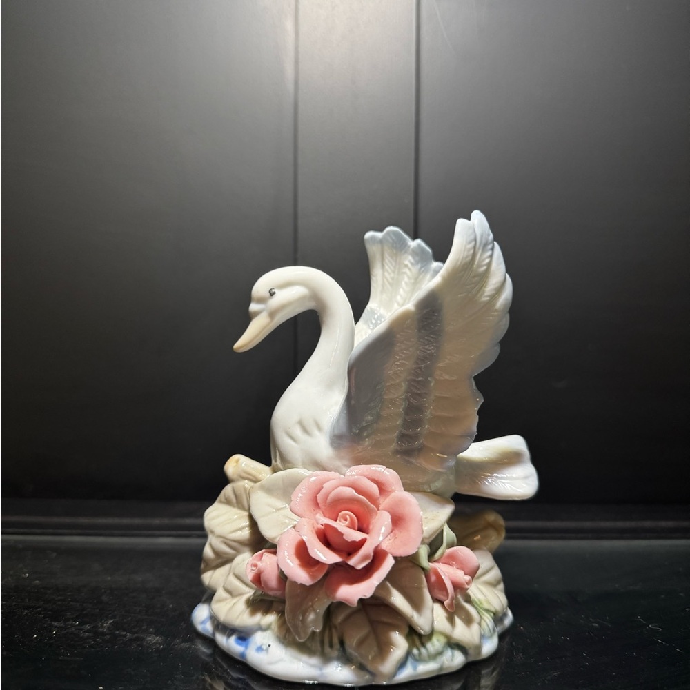 Elegant Swan Figurine with Pink Roses